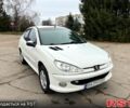 Білий Пежо 206, об'ємом двигуна 1.4 л та пробігом 229 тис. км за 2850 $, фото 3 на Automoto.ua