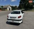 Білий Пежо 206, об'ємом двигуна 1.36 л та пробігом 221 тис. км за 1999 $, фото 11 на Automoto.ua