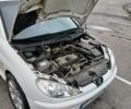 Білий Пежо 206, об'ємом двигуна 1.1 л та пробігом 237 тис. км за 2000 $, фото 3 на Automoto.ua