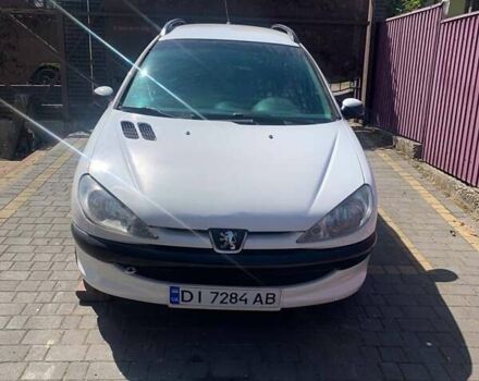 Белый Пежо 206, объемом двигателя 1.4 л и пробегом 200 тыс. км за 2500 $, фото 1 на Automoto.ua