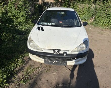 Белый Пежо 206, объемом двигателя 1.9 л и пробегом 300 тыс. км за 1000 $, фото 1 на Automoto.ua