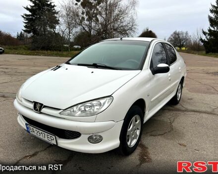 Белый Пежо 206, объемом двигателя 1.4 л и пробегом 229 тыс. км за 2850 $, фото 1 на Automoto.ua