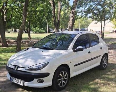 Білий Пежо 206, об'ємом двигуна 1.4 л та пробігом 235 тис. км за 4100 $, фото 1 на Automoto.ua