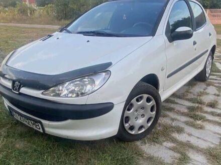 Білий Пежо 206, об'ємом двигуна 1.4 л та пробігом 231 тис. км за 2500 $, фото 1 на Automoto.ua