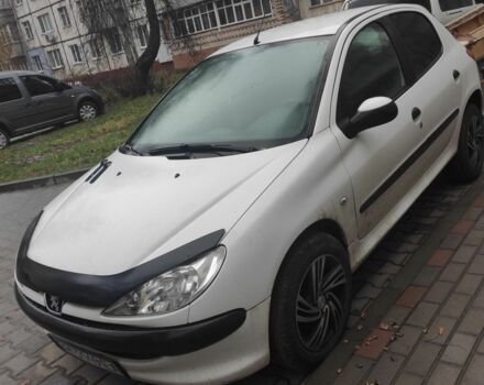 Белый Пежо 206, объемом двигателя 1.4 л и пробегом 201 тыс. км за 3700 $, фото 1 на Automoto.ua
