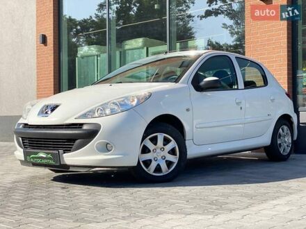 Білий Пежо 206, об'ємом двигуна 1.36 л та пробігом 206 тис. км за 4990 $, фото 1 на Automoto.ua