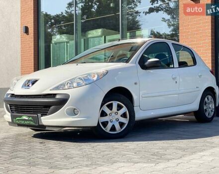 Белый Пежо 206, объемом двигателя 1.36 л и пробегом 206 тыс. км за 3790 $, фото 1 на Automoto.ua