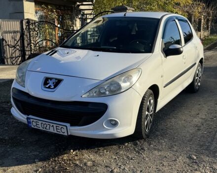 Белый Пежо 206, объемом двигателя 1.4 л и пробегом 152 тыс. км за 4700 $, фото 1 на Automoto.ua