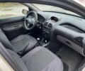 Бежевий Пежо 206, об'ємом двигуна 1.4 л та пробігом 377 тис. км за 2600 $, фото 4 на Automoto.ua