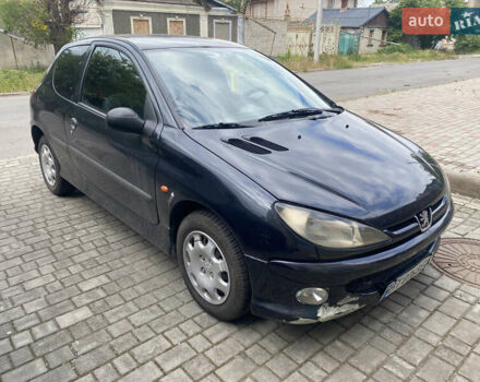 Черный Пежо 206, объемом двигателя 1.6 л и пробегом 211 тыс. км за 3100 $, фото 2 на Automoto.ua