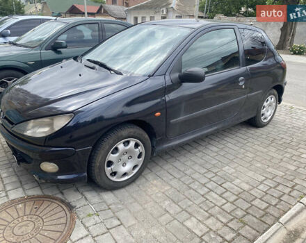 Черный Пежо 206, объемом двигателя 1.6 л и пробегом 211 тыс. км за 3100 $, фото 1 на Automoto.ua