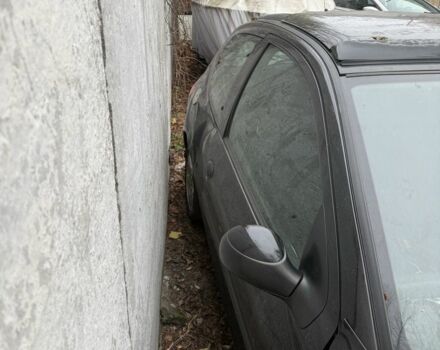 Черный Пежо 206, объемом двигателя 1.4 л и пробегом 240 тыс. км за 1200 $, фото 7 на Automoto.ua