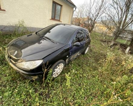 Черный Пежо 206, объемом двигателя 1.6 л и пробегом 237 тыс. км за 700 $, фото 4 на Automoto.ua