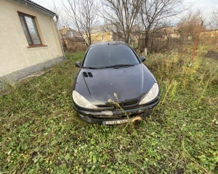Черный Пежо 206, объемом двигателя 1.6 л и пробегом 237 тыс. км за 700 $, фото 3 на Automoto.ua