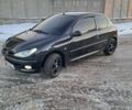 Черный Пежо 206, объемом двигателя 1.4 л и пробегом 380 тыс. км за 3300 $, фото 3 на Automoto.ua