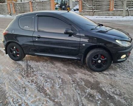 Чорний Пежо 206, об'ємом двигуна 1.4 л та пробігом 380 тис. км за 4200 $, фото 7 на Automoto.ua