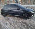 Чорний Пежо 206, об'ємом двигуна 1.4 л та пробігом 380 тис. км за 4200 $, фото 7 на Automoto.ua