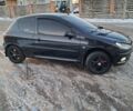 Черный Пежо 206, объемом двигателя 1.4 л и пробегом 380 тыс. км за 3300 $, фото 6 на Automoto.ua