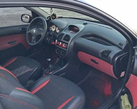 Чорний Пежо 206, об'ємом двигуна 1.4 л та пробігом 380 тис. км за 4200 $, фото 6 на Automoto.ua