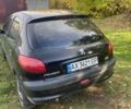 Черный Пежо 206, объемом двигателя 1.59 л и пробегом 240 тыс. км за 3100 $, фото 5 на Automoto.ua