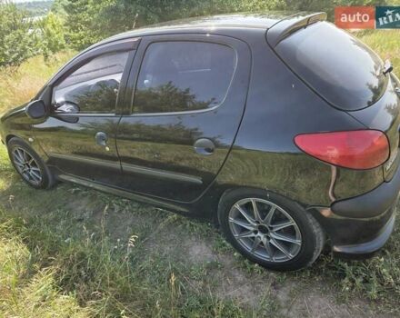 Чорний Пежо 206, об'ємом двигуна 1.59 л та пробігом 240 тис. км за 4200 $, фото 2 на Automoto.ua