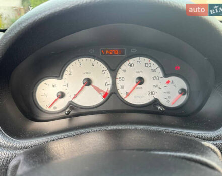 Черный Пежо 206, объемом двигателя 1.36 л и пробегом 142 тыс. км за 3500 $, фото 7 на Automoto.ua