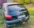 Черный Пежо 206, объемом двигателя 1.59 л и пробегом 240 тыс. км за 3100 $, фото 6 на Automoto.ua
