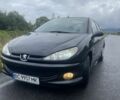 Черный Пежо 206, объемом двигателя 1.4 л и пробегом 320 тыс. км за 2650 $, фото 1 на Automoto.ua