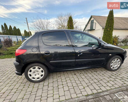 Черный Пежо 206, объемом двигателя 1.36 л и пробегом 142 тыс. км за 3500 $, фото 4 на Automoto.ua