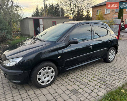 Черный Пежо 206, объемом двигателя 1.36 л и пробегом 142 тыс. км за 3500 $, фото 3 на Automoto.ua