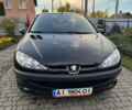 Черный Пежо 206, объемом двигателя 1.36 л и пробегом 142 тыс. км за 3500 $, фото 1 на Automoto.ua