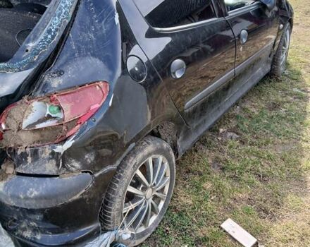 Чорний Пежо 206, об'ємом двигуна 1.6 л та пробігом 250 тис. км за 1678 $, фото 3 на Automoto.ua