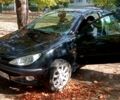 Черный Пежо 206, объемом двигателя 1.4 л и пробегом 180 тыс. км за 3050 $, фото 1 на Automoto.ua
