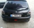 Чорний Пежо 206, об'ємом двигуна 1.4 л та пробігом 300 тис. км за 2000 $, фото 1 на Automoto.ua