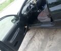 Чорний Пежо 206, об'ємом двигуна 1.4 л та пробігом 300 тис. км за 2000 $, фото 5 на Automoto.ua