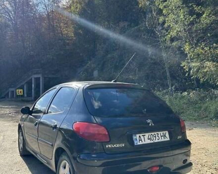 Черный Пежо 206, объемом двигателя 1.36 л и пробегом 355 тыс. км за 2300 $, фото 2 на Automoto.ua
