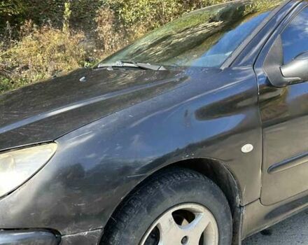 Черный Пежо 206, объемом двигателя 1.36 л и пробегом 355 тыс. км за 2300 $, фото 3 на Automoto.ua