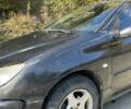 Черный Пежо 206, объемом двигателя 1.36 л и пробегом 355 тыс. км за 2300 $, фото 3 на Automoto.ua