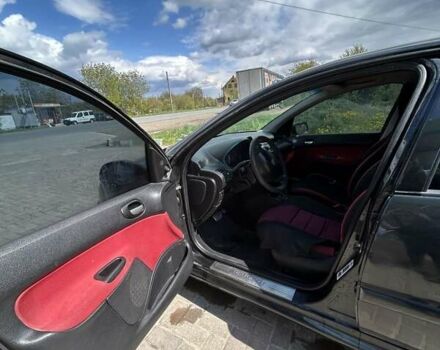 Черный Пежо 206, объемом двигателя 1.36 л и пробегом 355 тыс. км за 2650 $, фото 7 на Automoto.ua