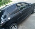 Чорний Пежо 206, об'ємом двигуна 1.4 л та пробігом 300 тис. км за 2000 $, фото 4 на Automoto.ua