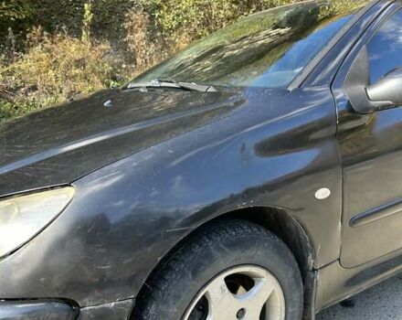 Черный Пежо 206, объемом двигателя 1.36 л и пробегом 355 тыс. км за 2650 $, фото 5 на Automoto.ua