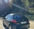 Черный Пежо 206, объемом двигателя 1.36 л и пробегом 355 тыс. км за 2650 $, фото 6 на Automoto.ua