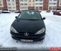 Черный Пежо 206, объемом двигателя 1.4 л и пробегом 230 тыс. км за 2300 $, фото 1 на Automoto.ua