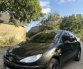 Черный Пежо 206, объемом двигателя 1.4 л и пробегом 192 тыс. км за 3500 $, фото 2 на Automoto.ua
