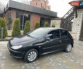 Чорний Пежо 206, об'ємом двигуна 1.36 л та пробігом 225 тис. км за 2600 $, фото 2 на Automoto.ua