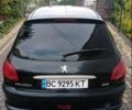 Чорний Пежо 206, об'ємом двигуна 1.4 л та пробігом 150 тис. км за 3000 $, фото 7 на Automoto.ua