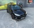 Черный Пежо 206, объемом двигателя 1.59 л и пробегом 256 тыс. км за 3300 $, фото 1 на Automoto.ua