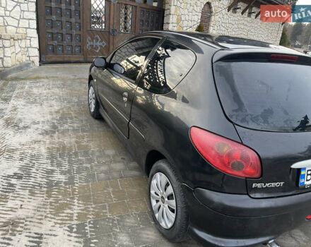 Чорний Пежо 206, об'ємом двигуна 1.36 л та пробігом 225 тис. км за 2600 $, фото 23 на Automoto.ua
