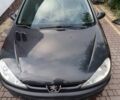 Черный Пежо 206, объемом двигателя 1.4 л и пробегом 100 тыс. км за 3100 $, фото 1 на Automoto.ua