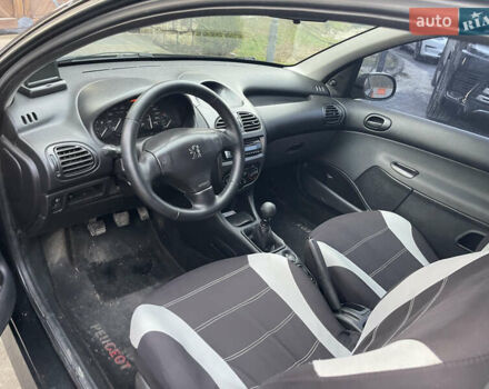 Чорний Пежо 206, об'ємом двигуна 1.36 л та пробігом 225 тис. км за 2600 $, фото 26 на Automoto.ua